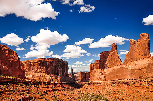 istock Arches National Park landscape view with blue sky and clouds 469535519