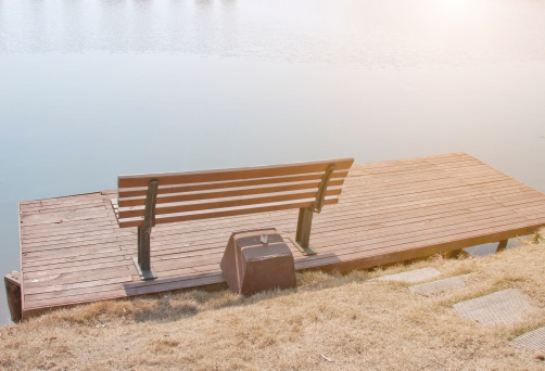 autumn lakeside park bench