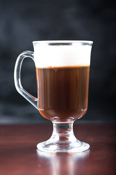 istock traditional strong irish coffee on wooden bar 469537604