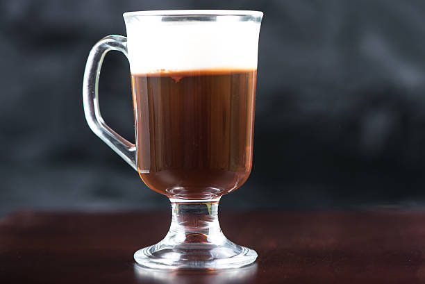 istock traditional strong irish coffee on wooden bar 469537606