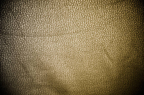 istock dark leather texture closeup to use as background 469537777