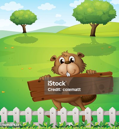 istock beaver with an empty wooden board 469537833