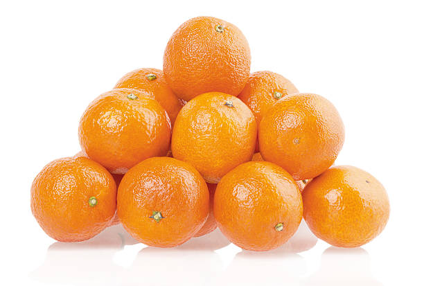 istock pile of tangerines on a white background 469538579