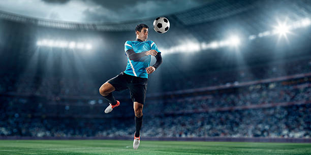 istock Professional football player soloing on the stadium 469540639