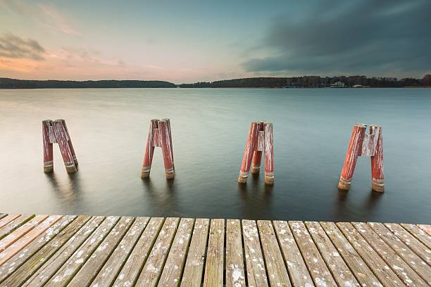 istock Lake landscape with jetty. Long time exposure 469540826
