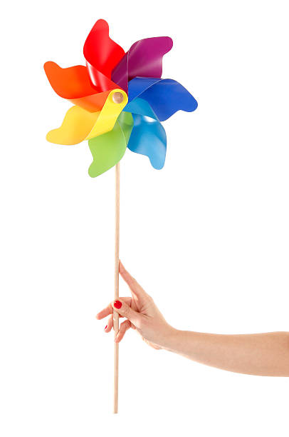 istock Hand is holding colorful pinwheel toy 469541777