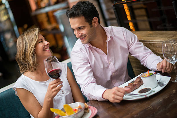 istock Happy couple at a romantic dinner 469544474