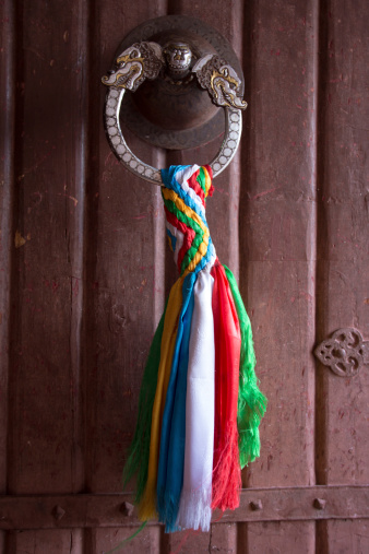 Dragon door-handle  with colorful flush. Various photographs of Lhasa in China