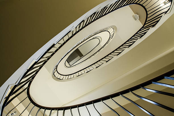 istock Three storey spiral staircase in la maison Gomin 469547429
