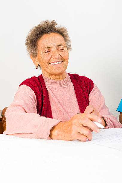 istock Elderly Signing Papers in Hospital 469547489