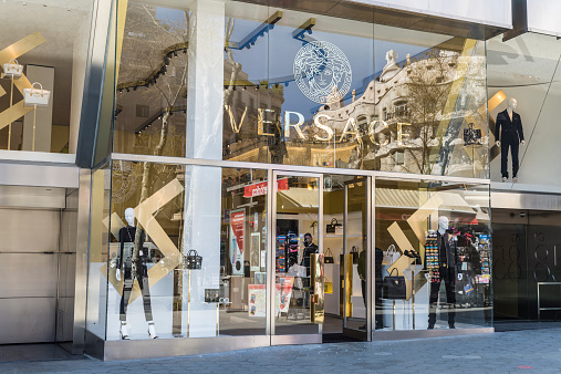Barcelona, Spain - March 27, 2015: Versace shop located on Passeig de Gracia, one of the most expensive streets in Europe.