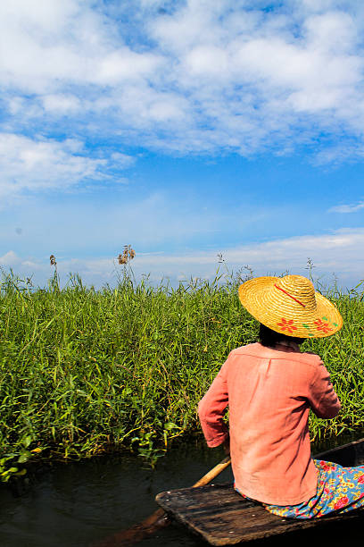 istock Burmese woman in Inle Lake 469549277