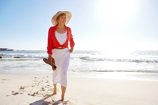 Shot of an attractive mature woman enjoying a day at the beachhttp://195.154.178.81/DATA/i_collage/pu/shoots/791274.jpg