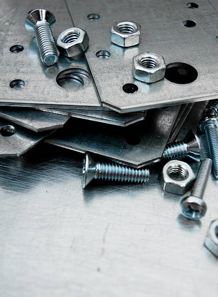 istock Metal preparations and fixing elements on the scratched metal background 469551164