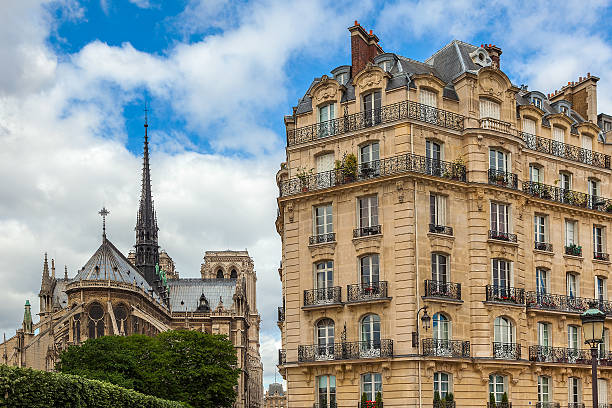 istock Parisian building and Notre Dame de Paris Cathedral. 469551228