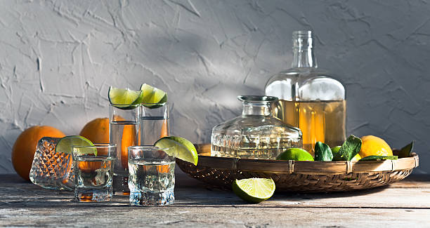 Tropical tequila with oranges and lime outside