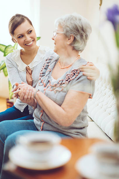 istock Granddaughter is hugging her grandmother 469552032