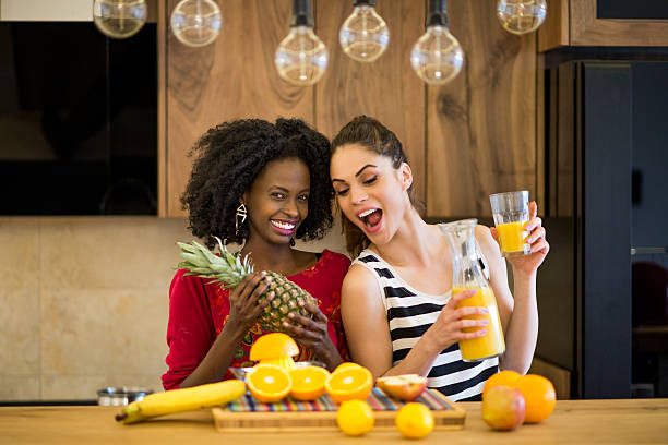 istock Women preparing juice in the kitchen 469552046
