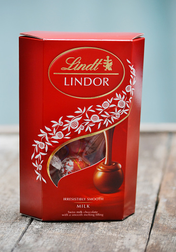 Port-Louis, Mauritius - April 10, 2015: A box of Lindt Lindor chocolate truffles. Lindt is part of the Lindt & Sprungli group, a Swiss company. Since 1845 Lindt has been producing the worlds finest chocolates