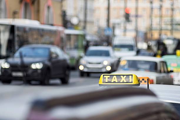 istock taxi on city streets 469554742