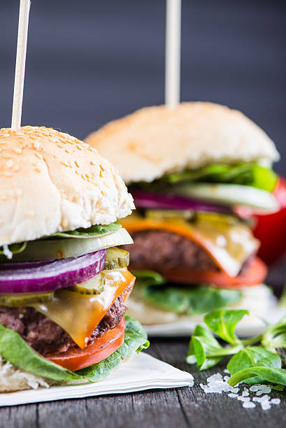 istock traditional pub style burger  on wooden table 469554748