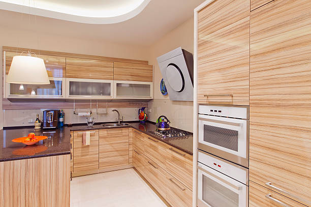 istock Kitchen in luxury home with large center island 469557687