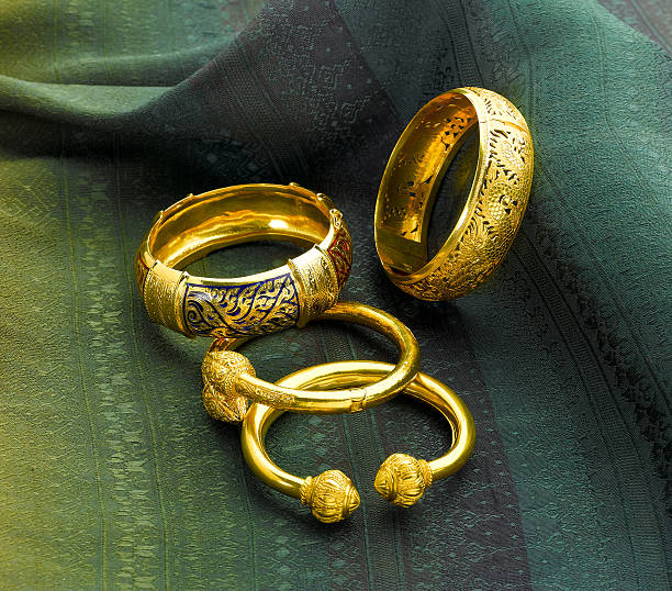 istock gold bracelets in Thai ancient style 469557814