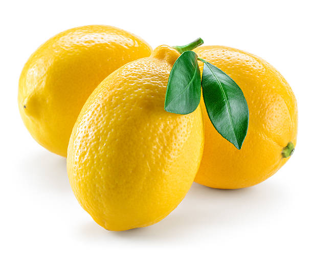 istock Lemons with leaves isolated on white 469557892