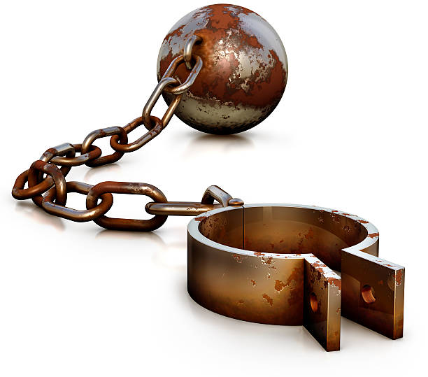 istock Close-up of rusty shackles with chain and ball 469564673