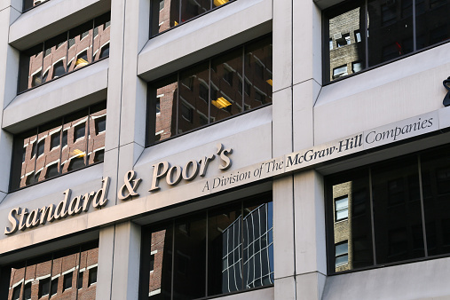 New York City, USA - May 19, 2014: The headquarter of the american financial company Standard and Poors in Lower manhattan. The picture shows the logo and the front of the building