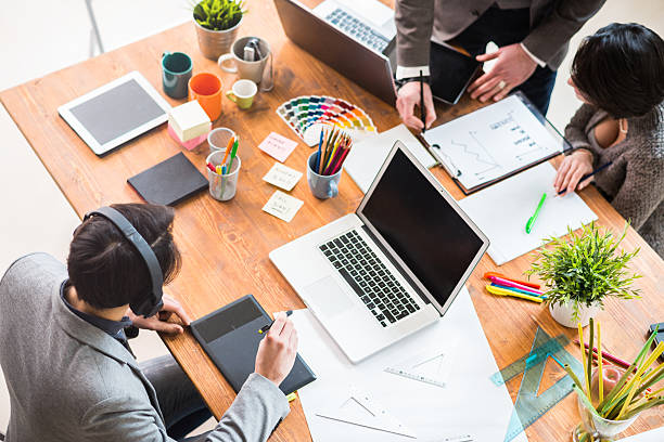istock People working in young startup coworking business 469567548