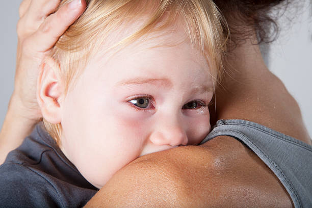 Les larmes aux yeux, adopté la mère de bébé - Photo