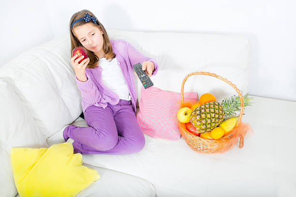 istock little girl with apple 469568787