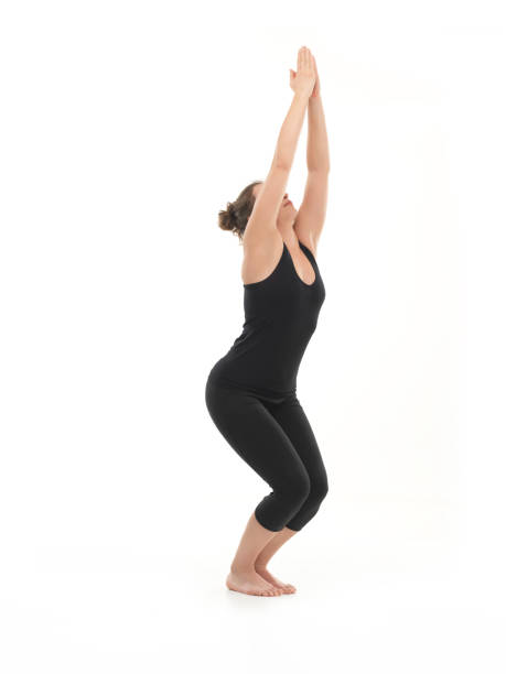 istock begginer yoga pose demonstration 469569553
