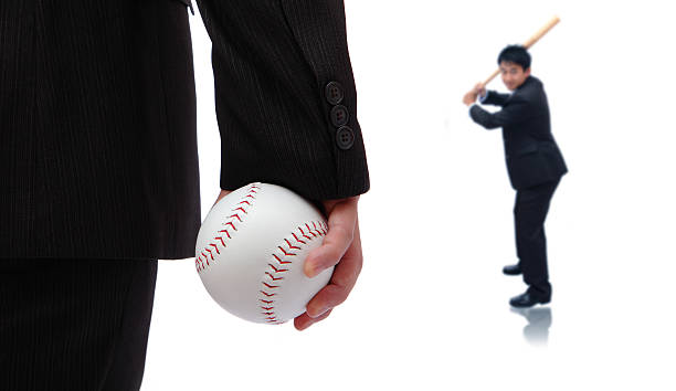 istock Play Ball ! Business man take baseball 469572527