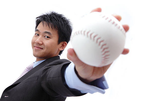 istock Business man take baseball 469572533
