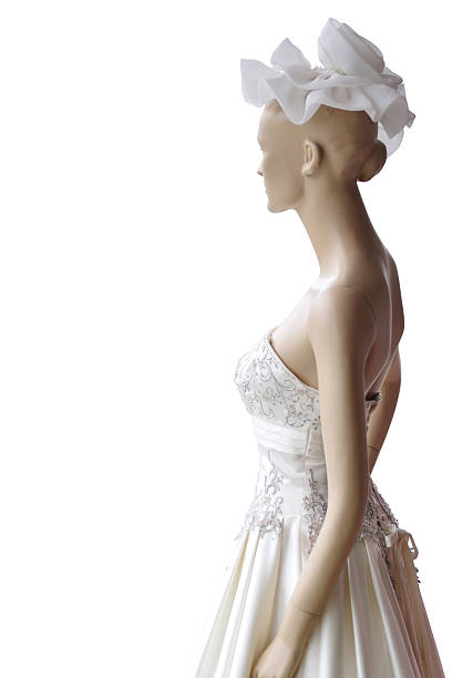 istock Wedding dress in a doll isolated with clipping paths 469574195