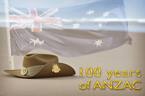 istock Australian flag and slouch hat on beach celebrating Anzac 469574538