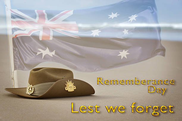 istock Army slouch hat on beach for Rememberance Day 469574560
