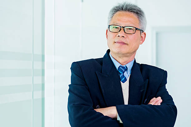 istock Confident Asian senior businessman 469577096