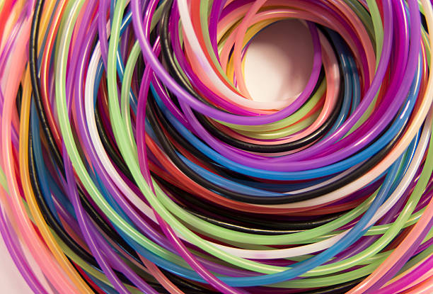 istock colored spiral of thread on a white background 469577996