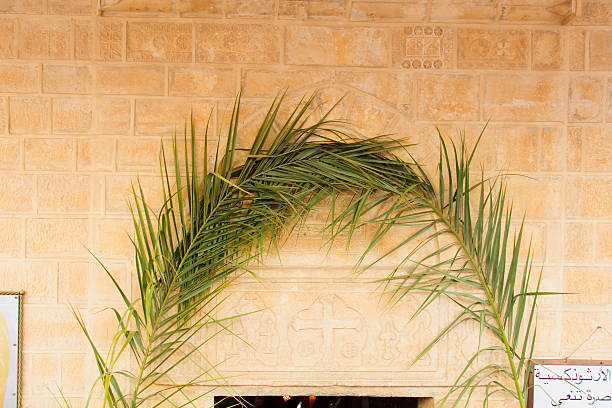 Nazareth, Israel - April 5, 2015: The door of the Greek Orthodox church of Annunciation, decorated for Palm Sunday, in Nazareth, Israel