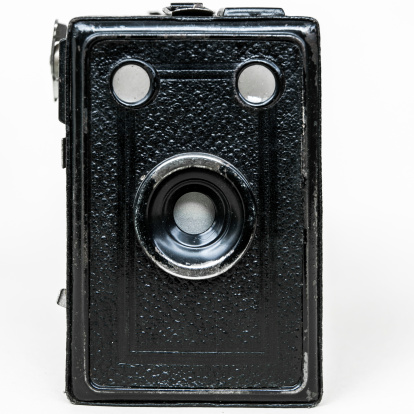 An old camera isolated on white background