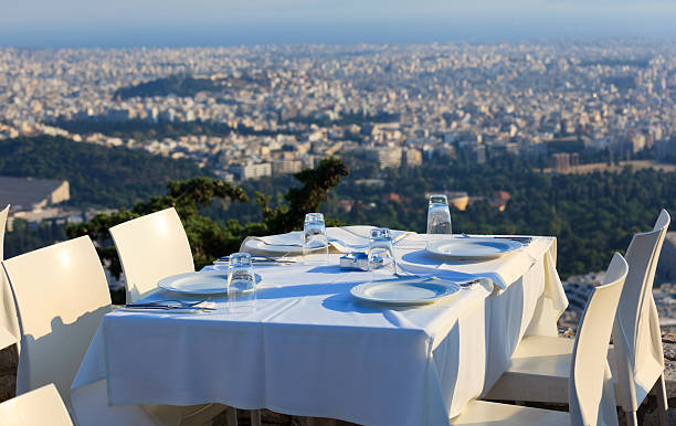 istock restaurant tables with panoramic view of athens town 469578537