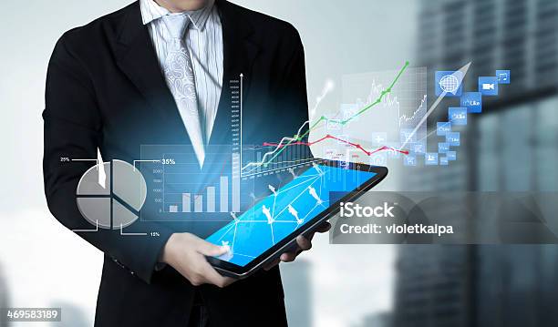 Touch Tablet In Hands Stock Photo - Download Image Now - Business, Analyzing, Digital Display