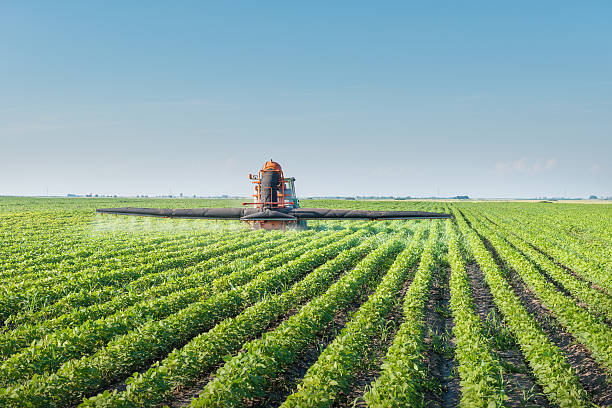 istock tractor spraying pesticides 469584945