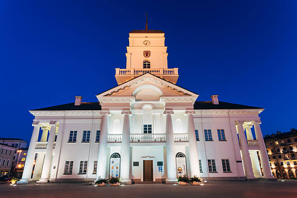 istock White Building Old City Hall In Minsk, Belarus. Night View 469587900