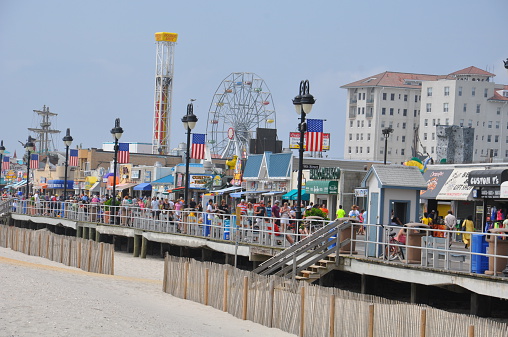 Ocean City, NJ, USA - September 1, 2013: Ocean City Boardwalk in New Jersey. The boardwalk is 2.5 miles long and one of the most well-known boardwalks in the world.