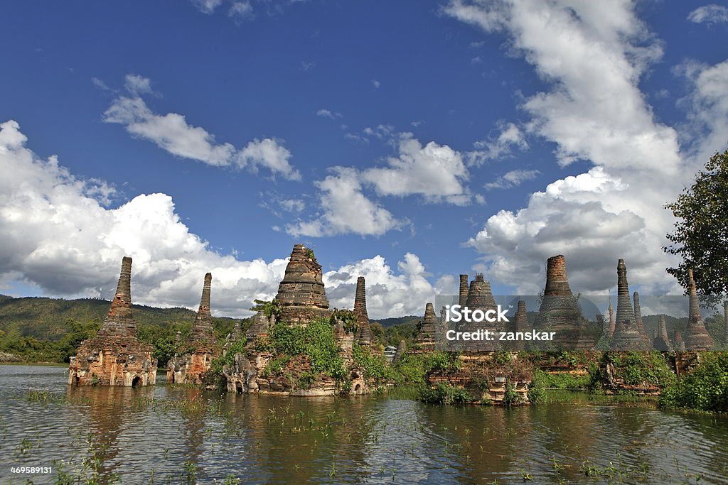 Ancient flooded pagodas near Samkar, Myanmar Ancient flooded pagodas in ruins near Samkar village on Inle lake, Shan state, Myanmar Ancient Stock Photo