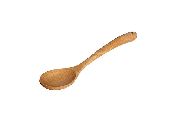 istock New wooden spoon isolated on a white background 469590652